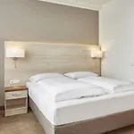 H+ Mitte